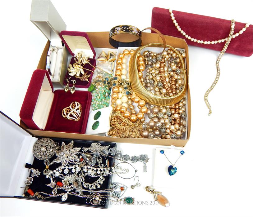 A very large quantity of costume jewellery to include silver items and Swarovski items