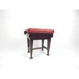 A Victorian Arts and Crafts walnut piano stool