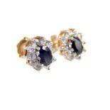 A pair of 9 ct yellow gold, blue and white sapphire cluster stud earrings