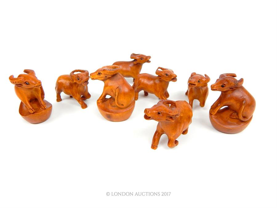 A collection of eight carved wooden netsuke in the form of animals - Image 2 of 2