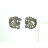 A pair of Art Nouveau, sterling silver and marcasite clip earrings