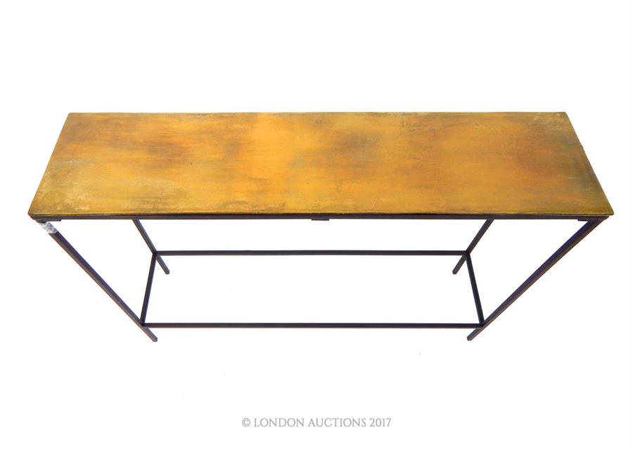 A contemporary, bronzed effect topped, console table; 99cm wide. - Image 2 of 2