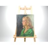 An unframed mid 20th century oil on canvas portrait of a glamorous lady in profile