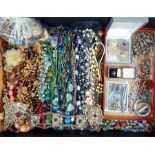 A large quantity of costume jewellery including sterling silver items of jewellery