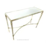 A silvered metal console table of rectangular form, having a mirrored top