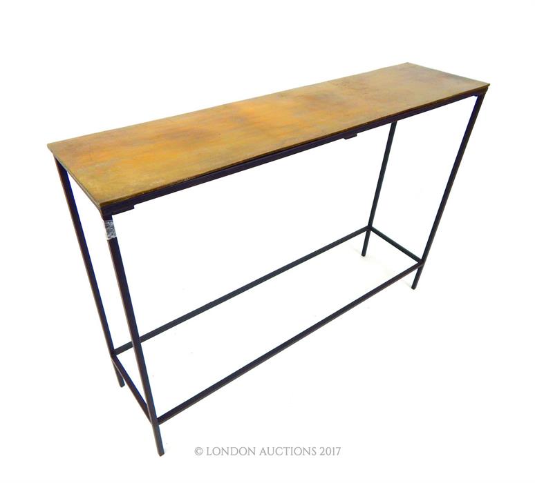 A contemporary, bronzed effect topped, console table; 99cm wide.