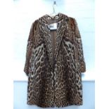 A designer, 'Coleman Sumberg', ocelot-fur, ladies coat