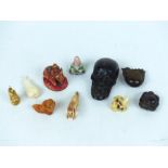 A collection of Japanese carved ivory netsuke