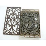 Four, antique, cast iron grilles/panels with a large cast iron door mat