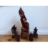 Five carved wooden figures
