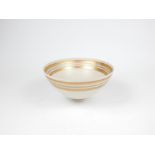 A fine, studio pottery porcelain and gold ringed, footed bowl by potter Bridget Drakeford