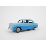 A Dinky Toys Ford Zephyr Saloon in two-tone blue with original box.