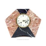 An Art Deco hexagonal, pink and black marble cased mantle clock