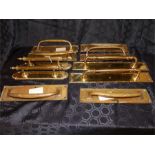 A large quantity of antique and reproduction, brass door handles, locks,