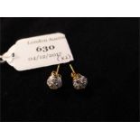 A pair of 18 ct yellow gold and pave diamond stud earrings