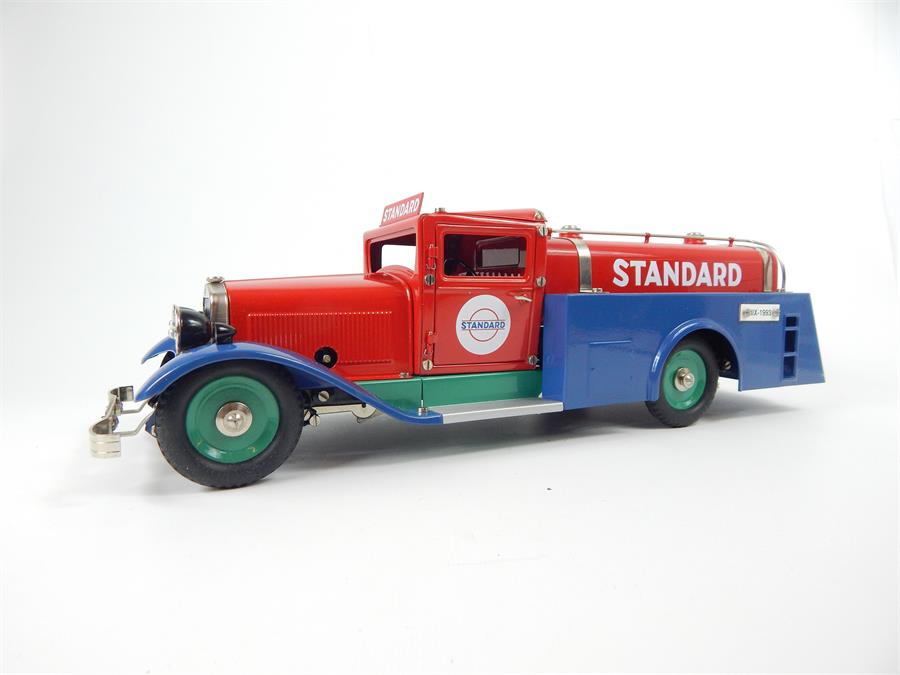 A Märklin model tin plate "Standard" wind up tanker; with handle opening doors; with key and