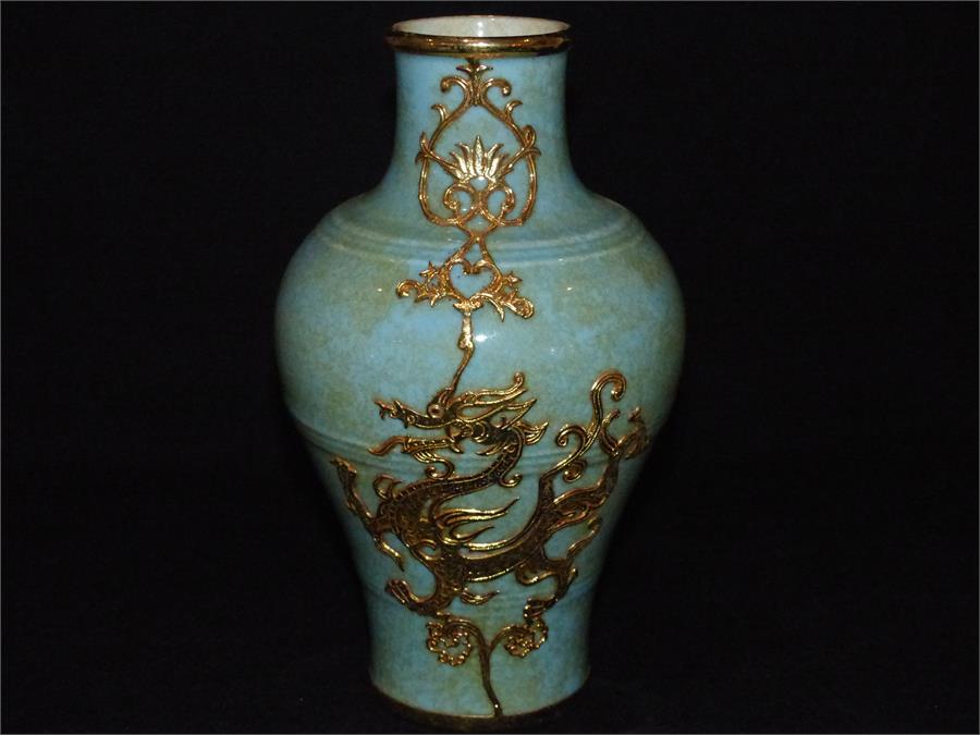 A Chinese celadon glazed baluster vase