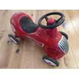 A Child's 'Radio Flyer' sit-on car