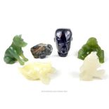 A collection of six carvings in jade and various hard-stones