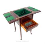 A ''Flahman & Co'' sewing table with sprung drawer with boxwood and satinwood inlays; 73 cm high