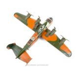 An American Marx tinplate model B52, friction clockwork plane with spark firing guns; 34cm long.