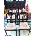 A set of six, 19th century, mahogany, Hepplewhite-style dining chairs