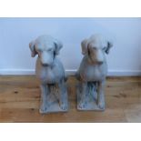 A pair of stoneware dogs; 71 cm