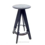 A designer, Tom Dixon, ebonised oak, stool with circular topped-seat