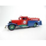 A Märklin model tin plate "Standard" wind up tanker; with handle opening doors; with key and