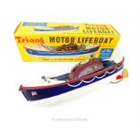 A vintage Tri-ang Motor Lifeboat with original box; missing mast.
