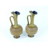 A matching pair of Doulton Lambeth, stoneware jugs