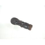 An early 20th century African tribal art terracotta pipe from Cameroon; 16cm long.