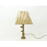 A brass column table lamp and shade; overall height 71cm.