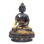 A gilt Bronze Buddha, seated holding a cup; 19.5cm high.