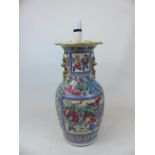A large Chinese vase, painted in the famille rose palette