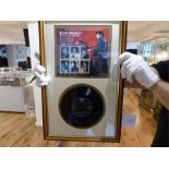 Two framed Elvis records