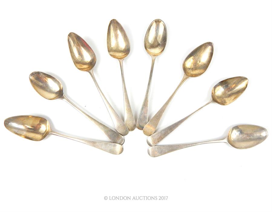 Eight Georgian silver teaspoons.