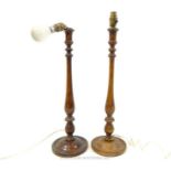 A pair of tall, Edwardian, turned, oak lamps