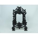 A late 19th century cast iron photograph frame