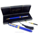 Two Yves Saint Laurent pens with one cased.