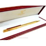 A Cartier cased pen in yellow metal; A/F