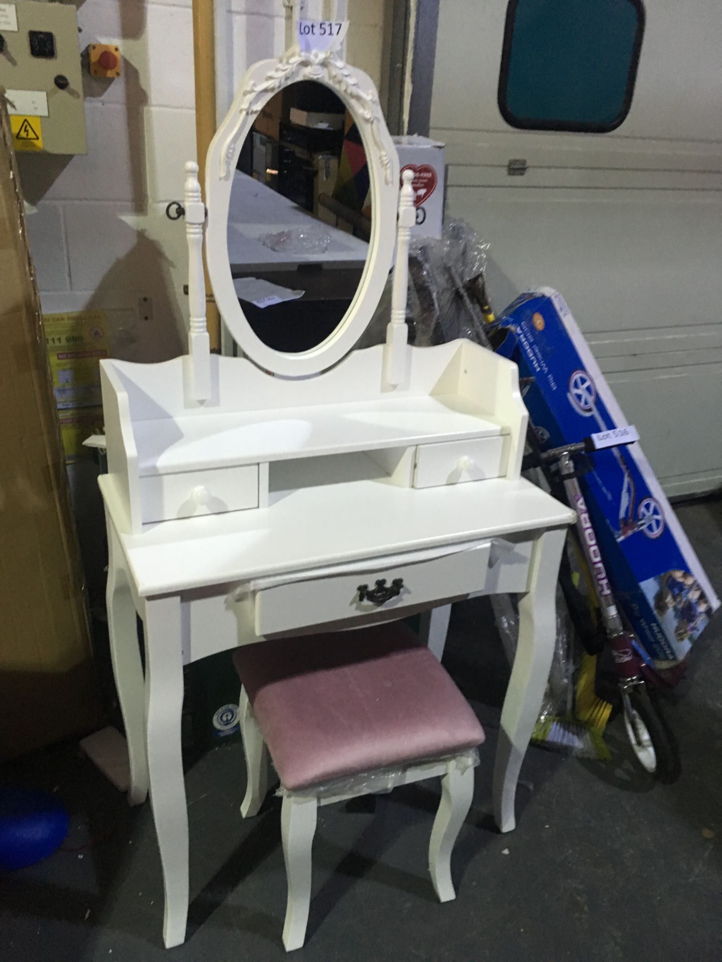 White antique style dressing table with mirror and pink cushioned stool. Damage to front corner