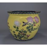 A large Japanese yellow enamel flower pot