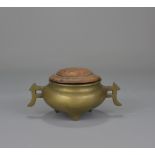 An 18th/19th Century Chinese bronze censer with a wooden cover