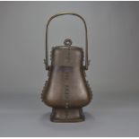 An 18th/19th Century Chinese bronze You wine vessel