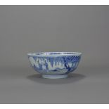 A Chinese blue and white porcelain bowl with figures in garden