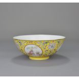 A 19th Century Chinese yellow ground famille rose porcelain bowl