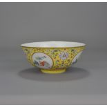 A 19th Century Chinese yellow ground famille rose porcelain bowl