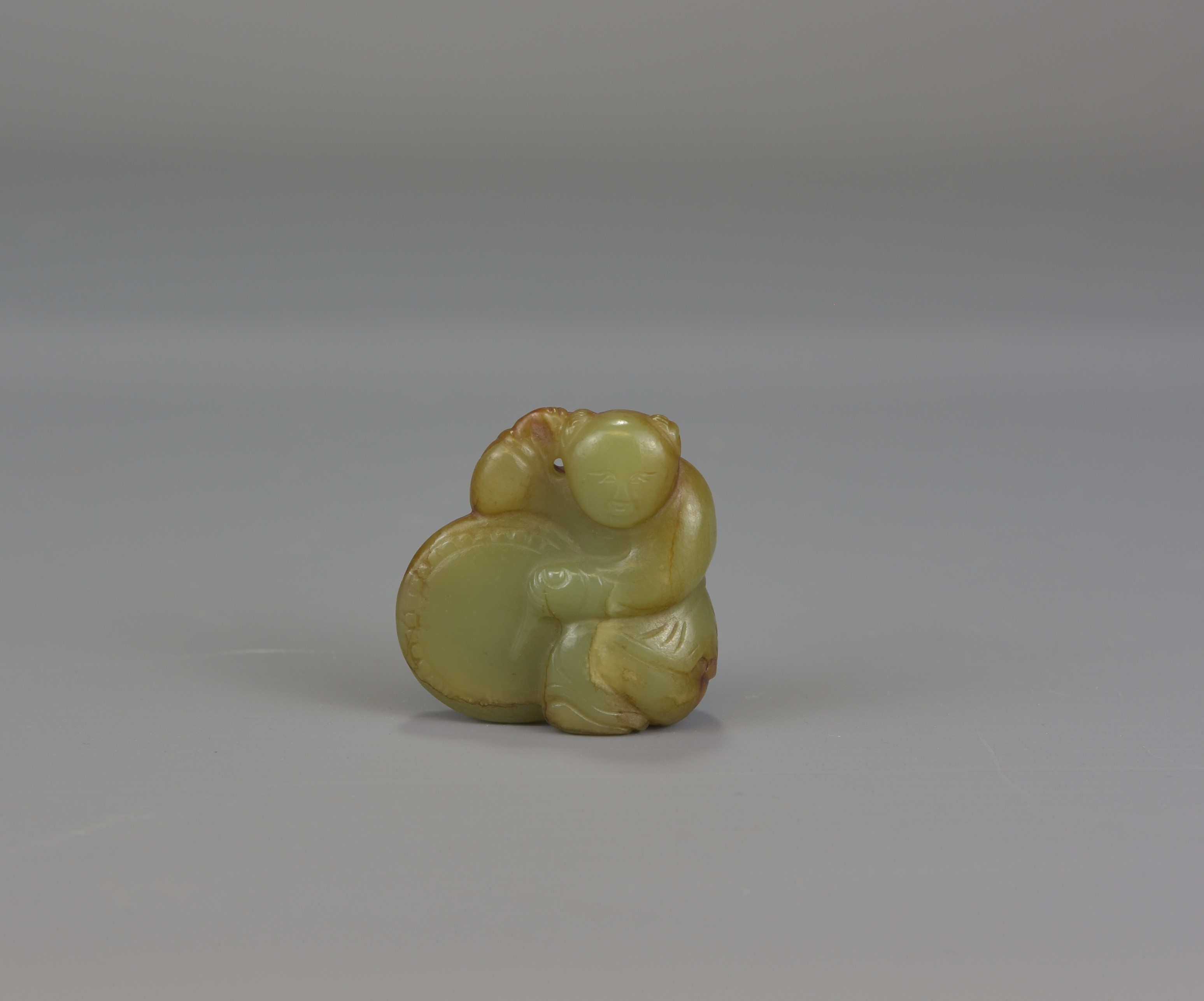 An 18th/19th century Chinese celadon Jade pendant
