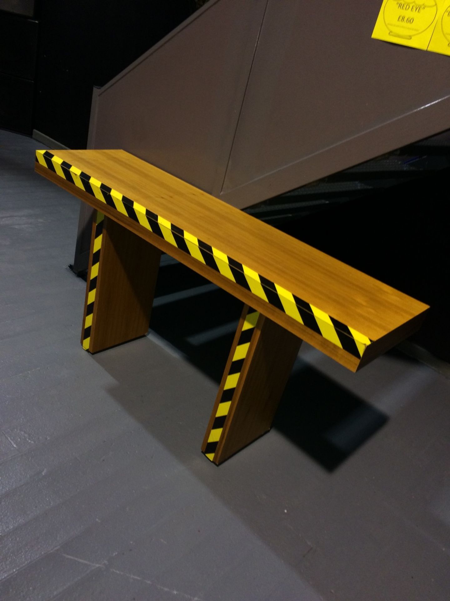 Wood Table Yellow And Black Tape Is Easily Removable - Image 3 of 4